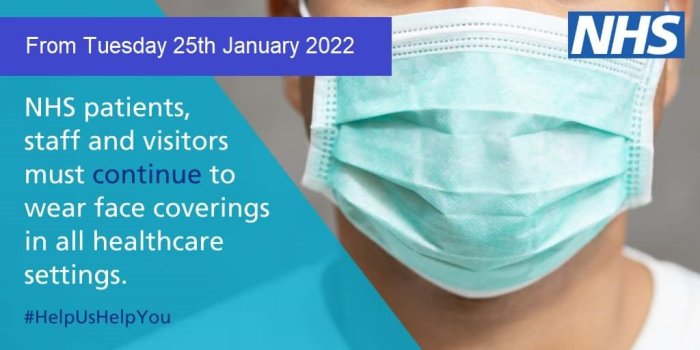 A person wearing a face covering with text reading From Tuesday 25th January 2022 NHS patients, staff and visitors must continue to wear face coverings in all healthcare settings.